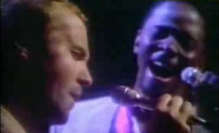 Phil Collins and Philip Bailey singing “Easy Lover”