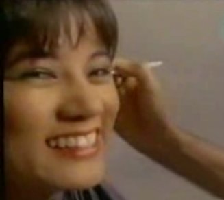 An Asian woman in the video for John Waite's Missing You
